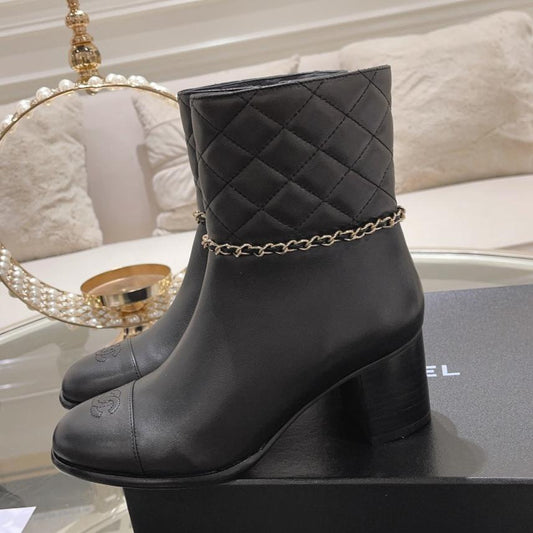 MID-HEEL ANKLE BOOTS IN BLACK CALFSKIN