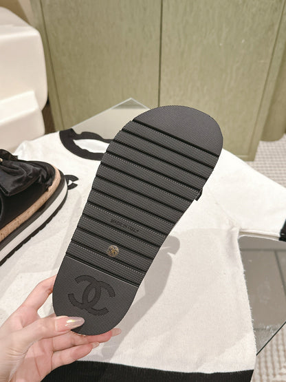CC SLIPPERS WITH SILK BOW IN BLACK COWHIDE