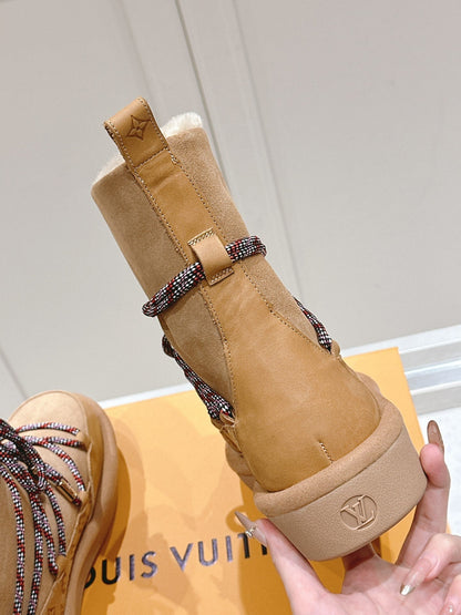 ASPEN PLATFORM ANKLE BOOT IN CIDER BROWN MONOGRAM DEBOSSED SUEDE AND SHEARLING