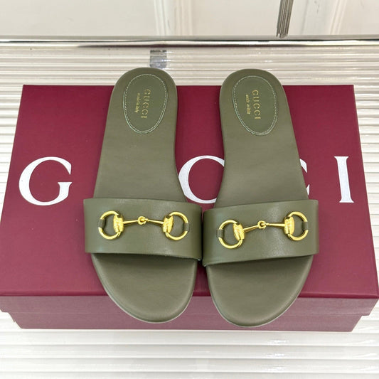SLIDE SANDALS IN MOSS GREEN CALFSKIN WITH GOLD HARDWARE