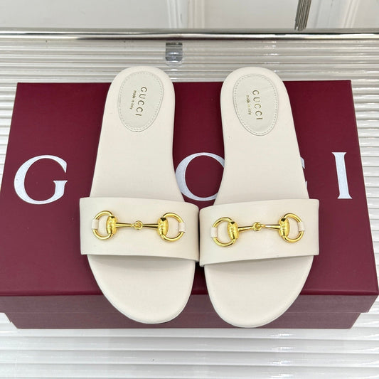 SLIDE SANDALS IN WHITE CALFSKIN WITH GOLD HARDWARE